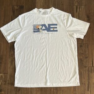 American Eagle Outfitters White Tee Featuring Snoopy